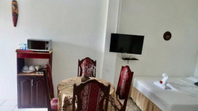Sunrise 2-Bed Sea View Studio near Airport with Infinity Pool & Deck, Ground Floor
